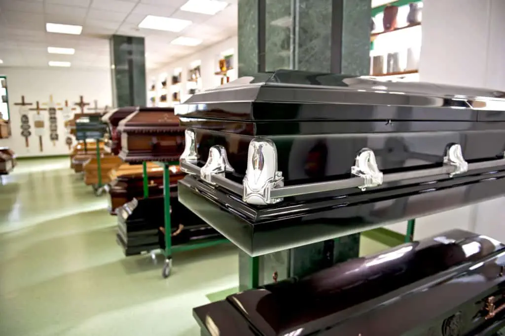 Close up of the black casket in a casket store.
