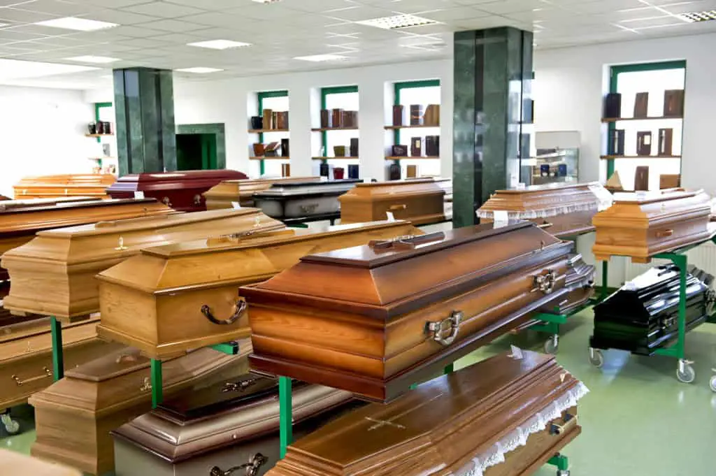 Various caskets exposed in a casket store.
